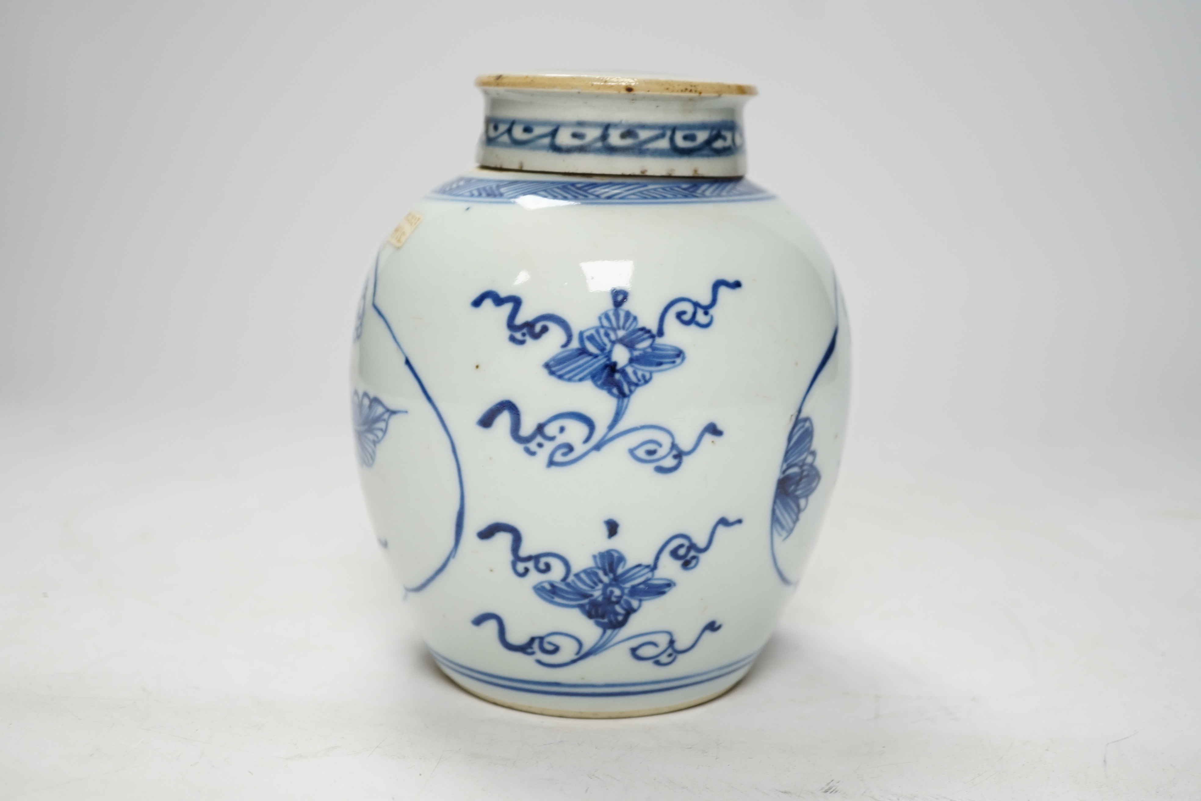 A Chinese Blue and white jar and odd cover, 15cm high